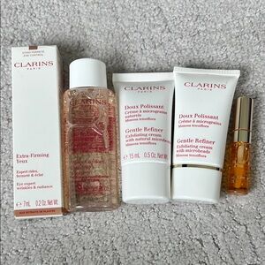 NWT Clarins Skincare Set extra firming, cleanser, lip oil, gentle refiner
